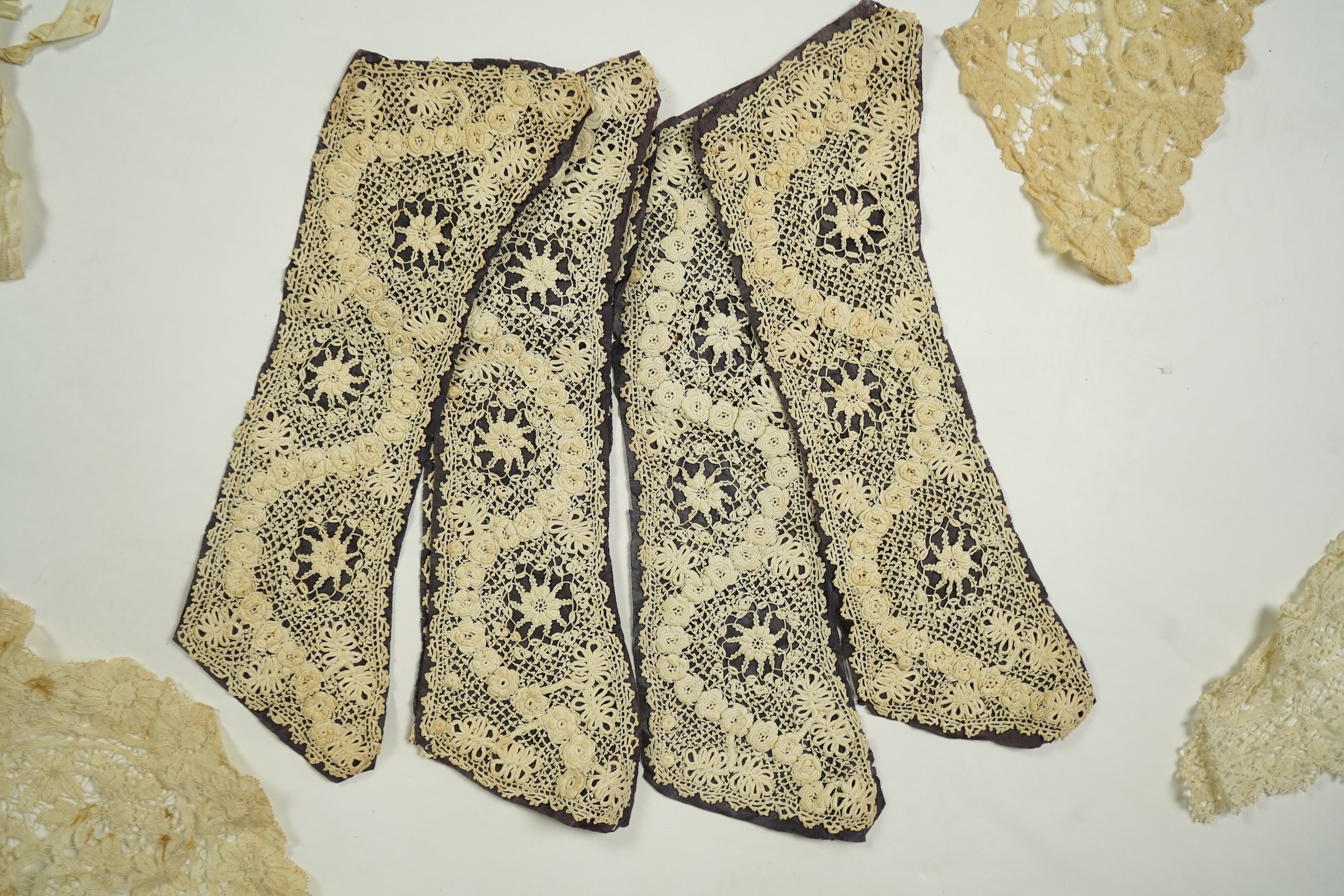 A mixed Brussels bobbin lace and Point de Gaze lace collar, another smaller collar, a similar length of trim and butterfly motif, together with a Brussels bobbin collar and trim, an Irish crochet cuffs, a Valenciennes la